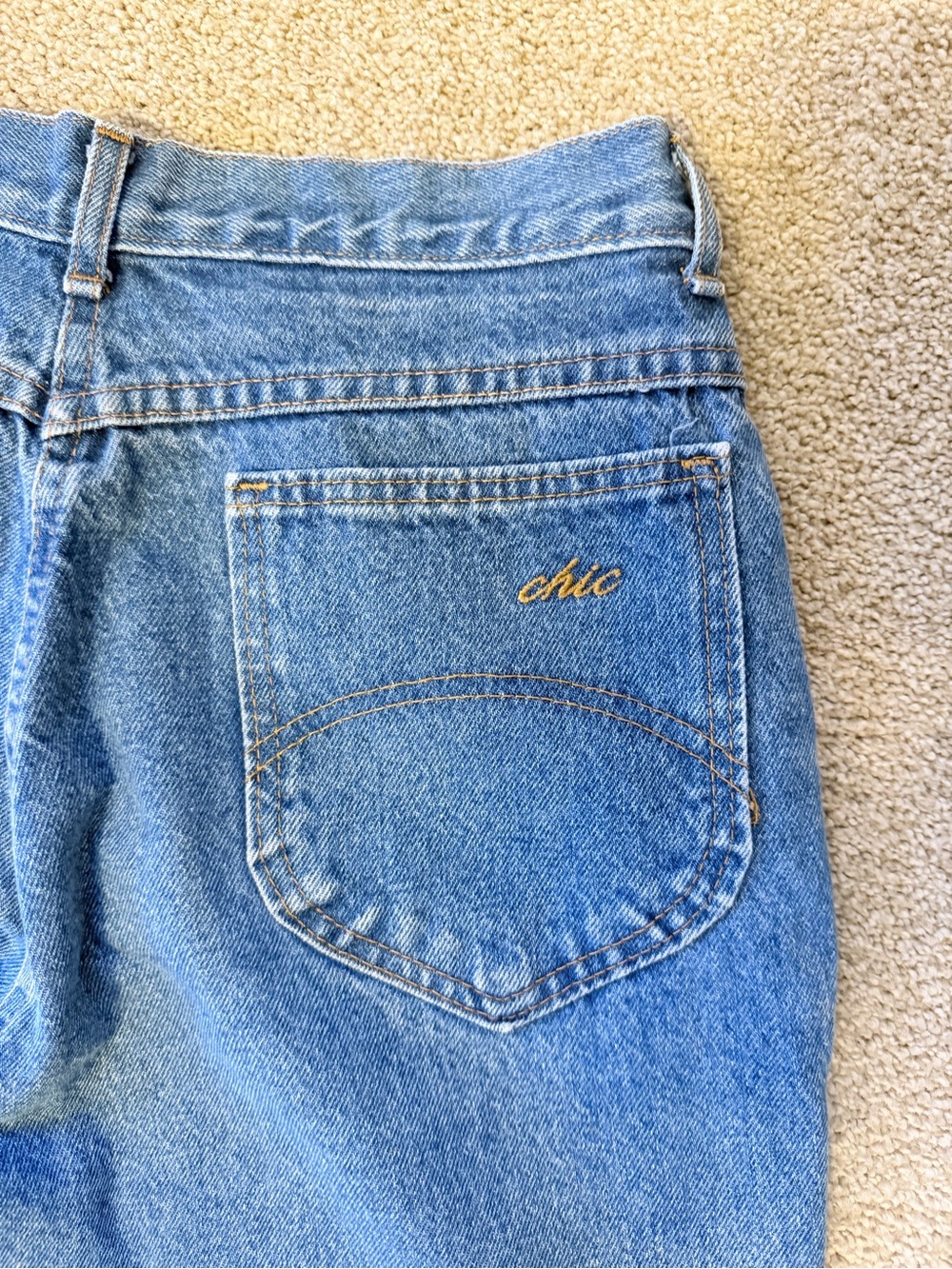 chic Light Blue High-Rise Jeans with Gold Embroidered Logo